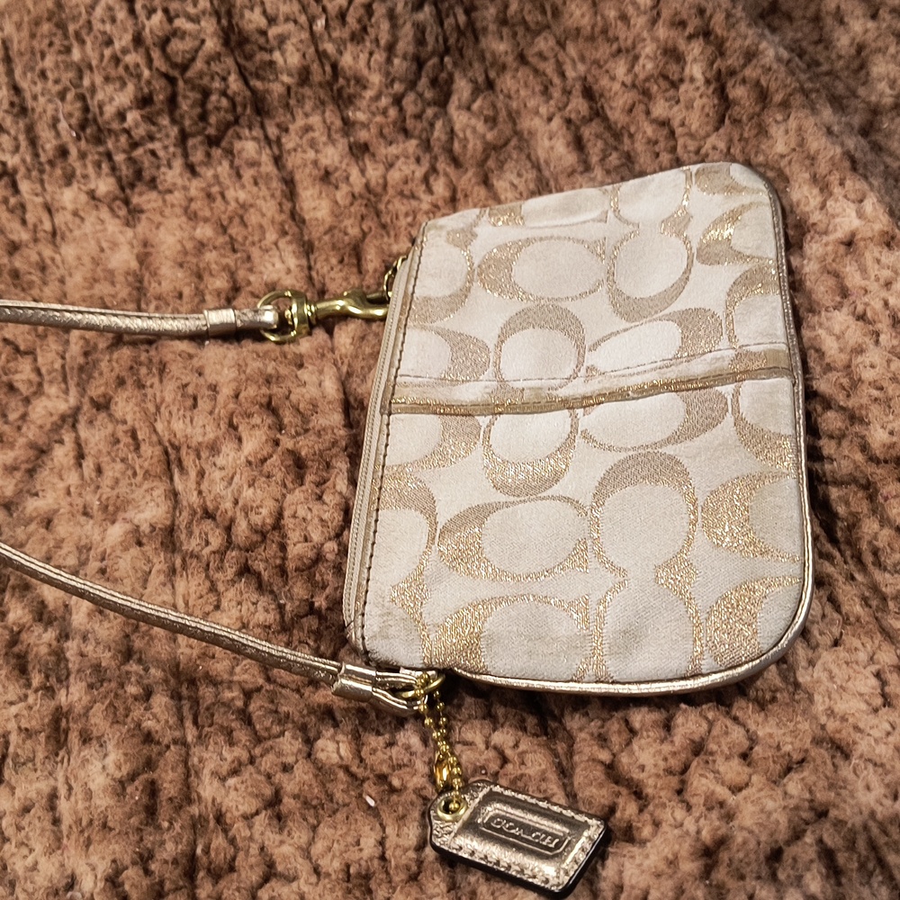 Coach wristlet, metallic rose gold, EUC, 6.5" x 4"
